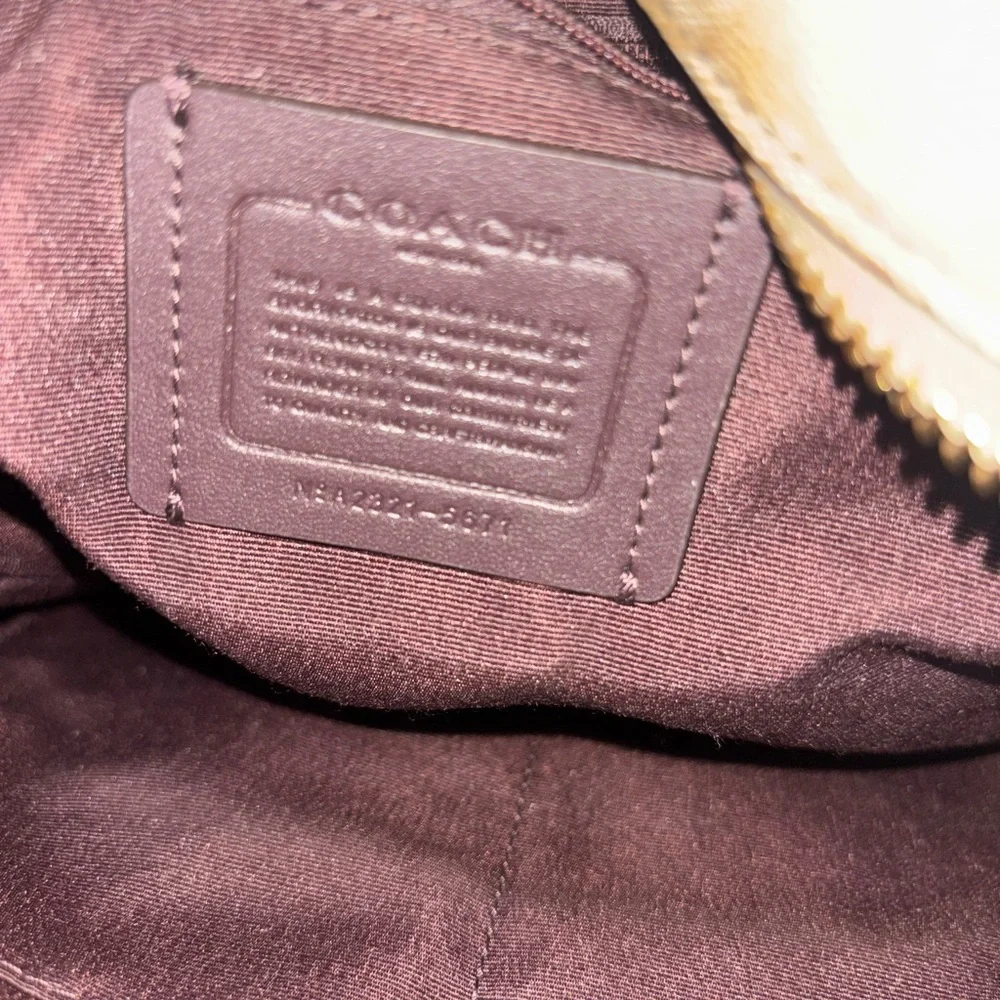 Coach Signature Canvas and Pink Leather Backpack